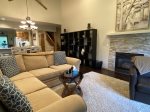 Living Room with Gas Fireplace and Large Flat Screen 